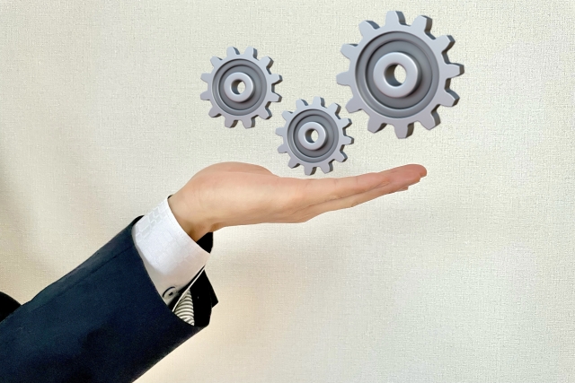 法人営業と個人営業の仕組みの違いをイメージした歯車のイラスト